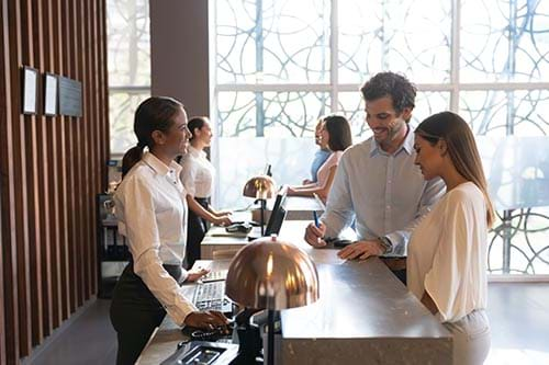 guest checking into hotel