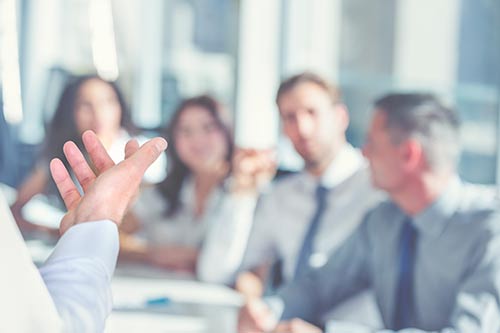 photo of a person presenting to a group